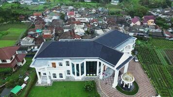 Aerial View of Luxurious Mansion with Extensive Grounds and Modern Design video