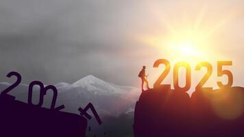 New year 2025 or straight forward concept. Text 2024 to 2025 written on the mountain top with at sunrise. Concept of planning, goal, challenge, new year resolution and start. video