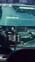 Vertical Empty military operation room headquarters with a big screen and desks used for reconnaissance and national safety missions, oversight on a world map. Army intelligence gear and CCTV footage. video