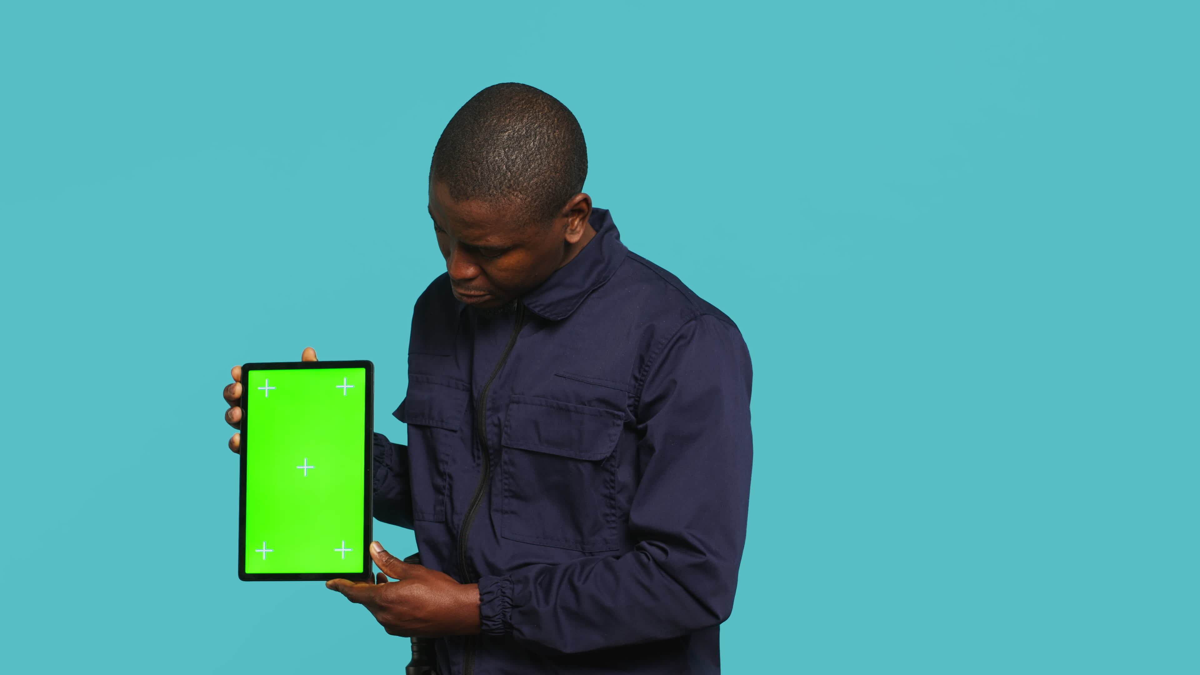 Happy security guard working protection job presenting mockup tablet