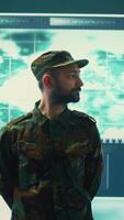 Vertical Government military hackers engaged in hybrid warfare strategies. Using sophisticated software and technology to secure information, prevent breaches and protect military operations. Camera B. video