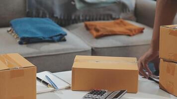 couple start up small business owner are thrilled with their success in online sales and e-commerce. video