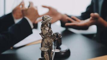 Judge gavel with Justice lawyers having team meeting at law firm background. Concepts of Law and Legal services. video