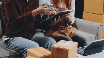 couple start up small business owner are thrilled with their success in online sales and e-commerce. video