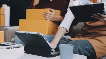 couple start up small business owner are thrilled with their success in online sales and e-commerce. video