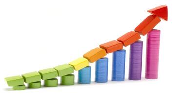 A colorful wooden block arrow pointing upwards, symbolizing growth and progress photo