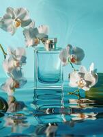 Perfume bottle among white orchids and reflected on a water surface photo