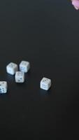 Enjoying a lively game of dice with friends, creating an interactive and fun atmosphere video