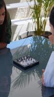 Engage in a challenging game of chess with strategic moves and intense concentration video