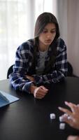 Playing a Dice Game at Home with Friends can strengthen relationships and create fun memories video