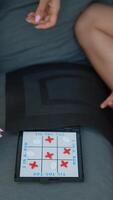 Playing TicTacToe at home can bring bonding, a brain challenge, and fun in a cozy setting video
