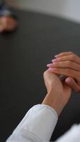 Hands are rolling dice on a black tabletop, creating excitement and anticipation video