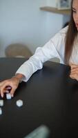 Dice game at the office promotes teamwork and fun among colleagues in a modern work environment video