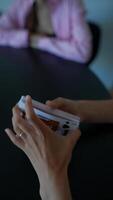 A group of individuals enjoying a game of cards together in a relaxed and casual environment video