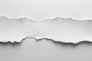 Torn white paper with rough, jagged edges and a minimalistic look photo