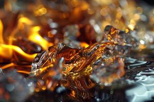 Molten glass in various stages of cooling with fiery reflections photo