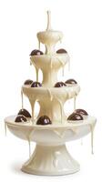 White Chocolate fountain on a white background. photo