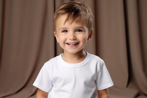 Portrait of a cute little boy in a white t-shirt. photo
