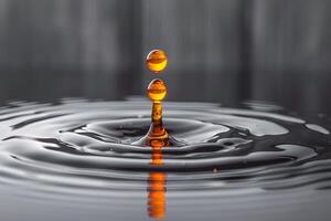 Splash of Orange Droplets on a Reflective Surface Macro Photography for Art Prints and Decor photo