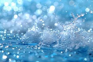 Splashing Blue Water Drops with Sparkling Bokeh Background for Design, Poster, and Print photo