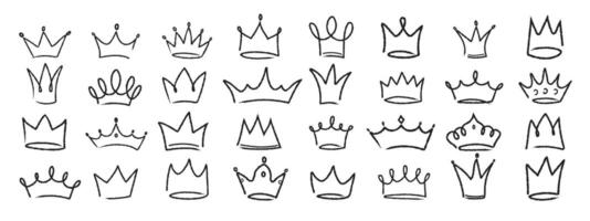 Hand drawn hand drawn linear grunge set of crowns. Collection of sketches of royal diadems drawn in chalk , charcoal. illustration vector
