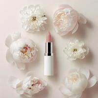 Lipstick make up packaging mockup, flowers background photo