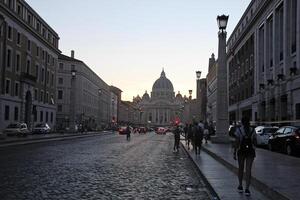 Rome, Italy - September 13 2022 - Vatican City and St Peter's Basilica and Square with Traffic and Tourists photo