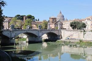 Rome, Italy, 2022 - Rome Cityscape Panoramic View with Ponte Vittorio Emanuele II, Vatican and Tiberis or Tevere River photo
