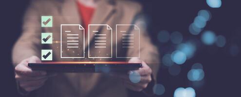 Accountant showing office document auditing concept ,plan review process and assess correctness ,Management of important document storage of organization ,document system ,accountant Audit documents photo