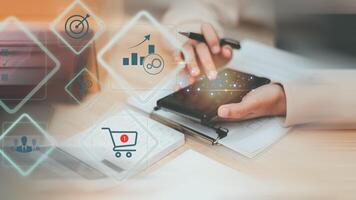 Selling online on Internet ,SME ,e-commerce ,business strategy for goals ,Checking product stock ,increase business profits ,Developing marketing efficiency strategies ,Revenue and earnings analysis photo