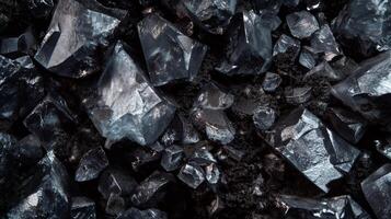 Macro shot of dark crystals. Mineral texture background. Design element for graphics or product display. photo
