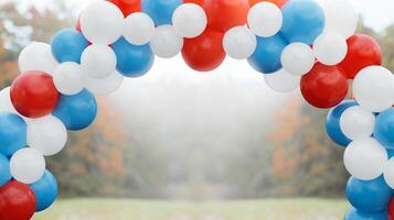 Festive Arch of Red, White, Blue Balloons in Outdoor Setting with Blurry Autumn Background for Independence day, Holiday Celebration Design with Copy Space photo