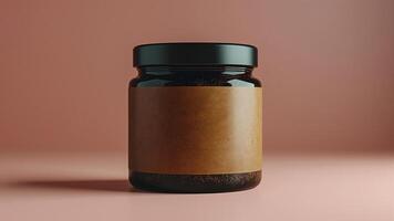 Minimalist Brown Glass Jar With Blank Brown Paper Label On Pink Background For Mockup And Branding Ideas photo