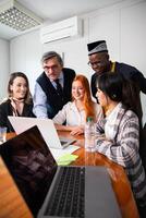 Business meeting between business partners, multi ethnic group with different ages, vertical photo