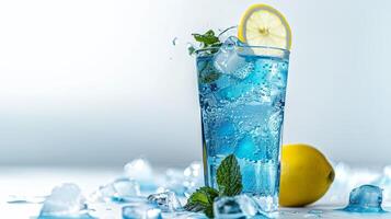 Blue Lagoon cocktail with lemon and mint photo