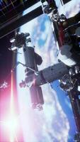International Space Station in outer space over the planet Earth orbit, vertical video