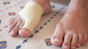 Experience comfort by wearing a Bunion Corrector on your foot as you walk on the carpet video