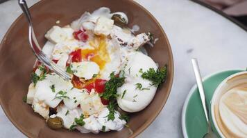 Enjoy a delightful meal of Brunch Bowl featuring Poached Eggs and a Latte Godet video