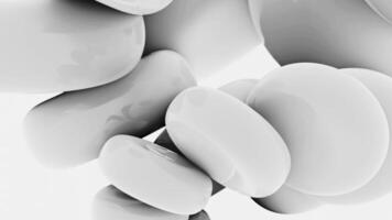 Abstract animation of monochrome small beads rotating and moving one by one. Design. Black and white spinning 3D shapes. video