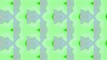 Mosaic kaleidoscopic pattern with flashing colors. Motion. Bright colorful flashes of mosaic pattern with geometric shapes. Psychedelic pattern with geometric repeating shapes. Warning flashing lights video