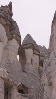 Big brown rocks. Action.Huge stone rocks taken from the bottom and rain dripping from the top. video