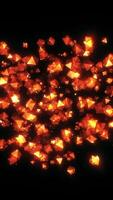 Abstract stream of shiny orange particles on a black background. Design. Mirrored flying pieces of glass flying and glowing. video