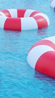 Close up of abstract floating rescue buoys on the water surface. Design. A floating lifebuoy in the sea. video