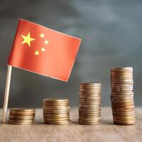 Stacked coins symbolizing financial growth, with China Flag photo