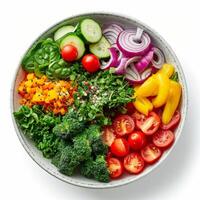 Freshly Cut Vegetables in a White Bowl on a White Background photo