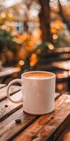 Close Up of Coffee Cup on Wooden Table at Outdoor Cafe photo