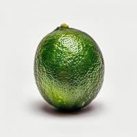 A Single Green Lemon on a White Background photo