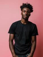 Black T-Shirt Model Posing Against Pink Background photo