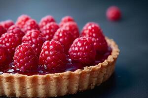 Ripe Raspberry Tart With Flaky Crust on Dark Background photo