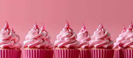 Minimalistic group pink holiday cupcakes lined up row with smooth frosting in light pastel colors photo